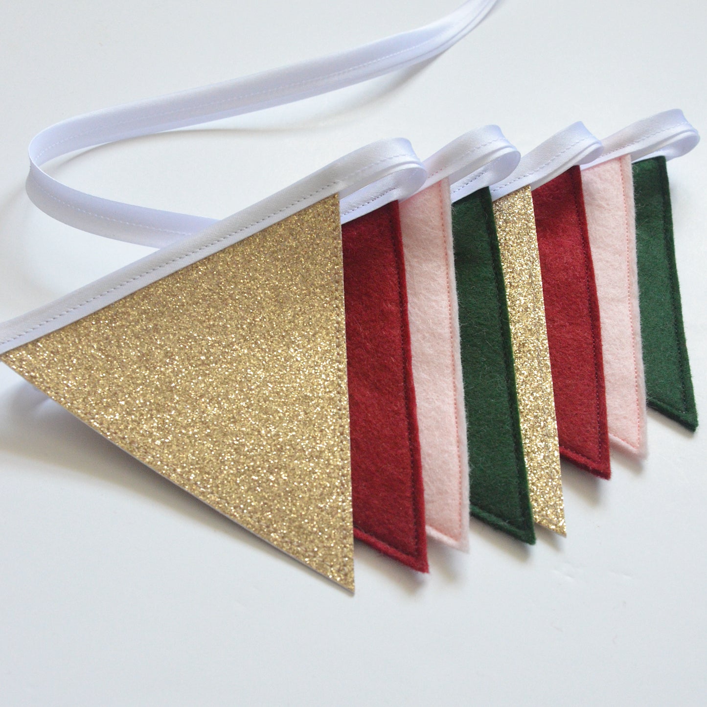 Sparkly Christmas bunting is festive colours