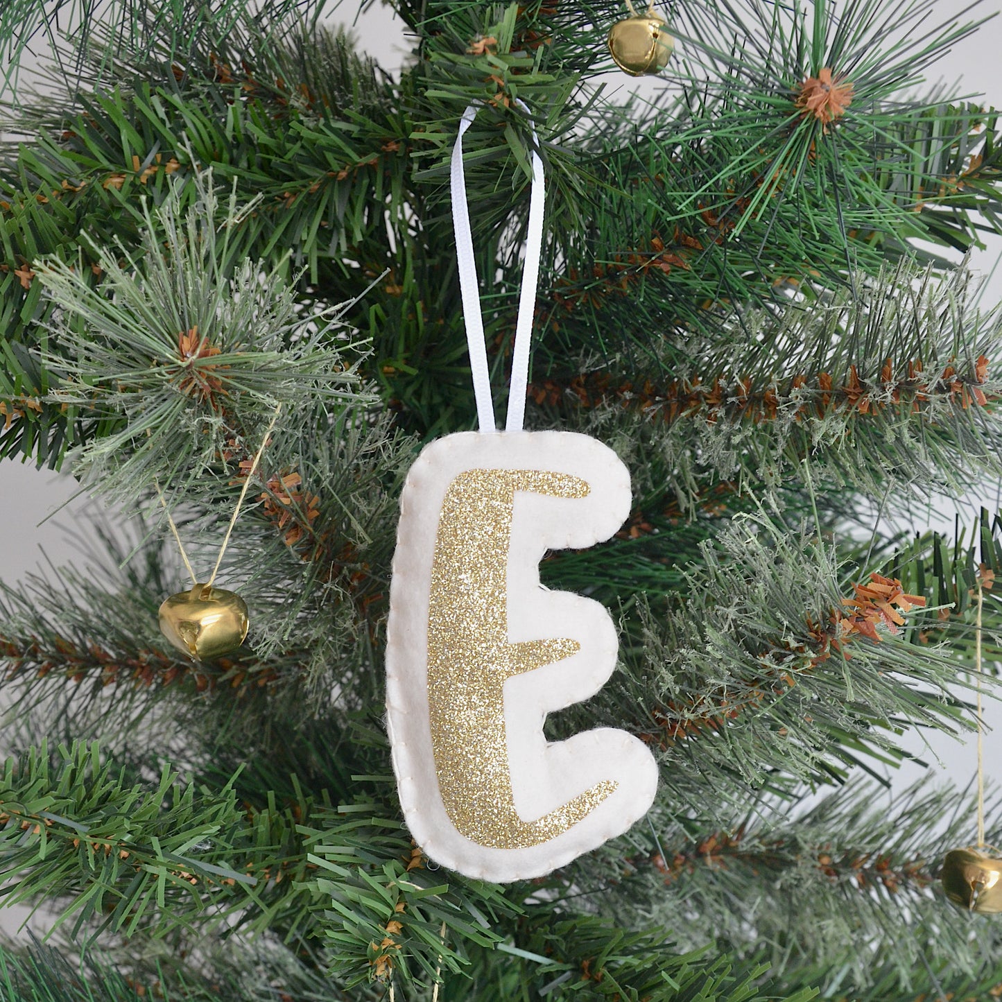 Cream and gold initial Christmas tree decoration