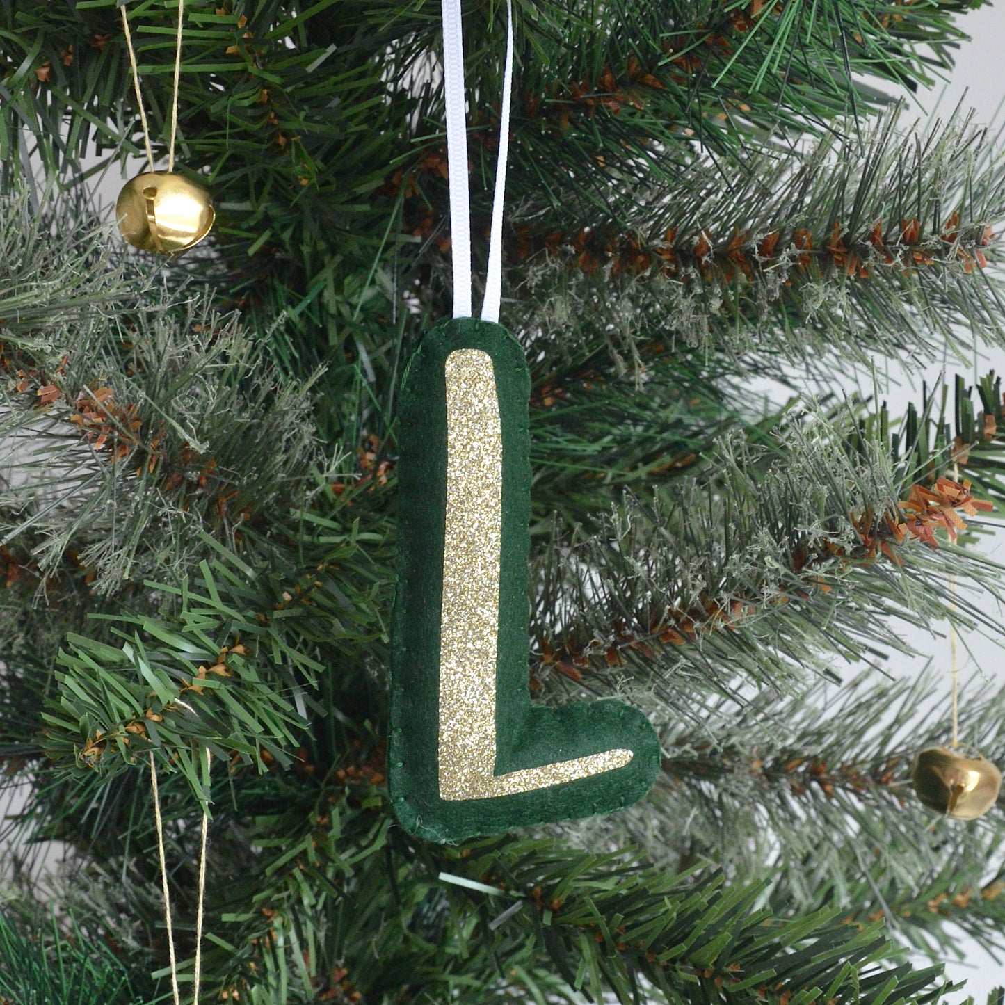 Green initial Christmas tree decoration