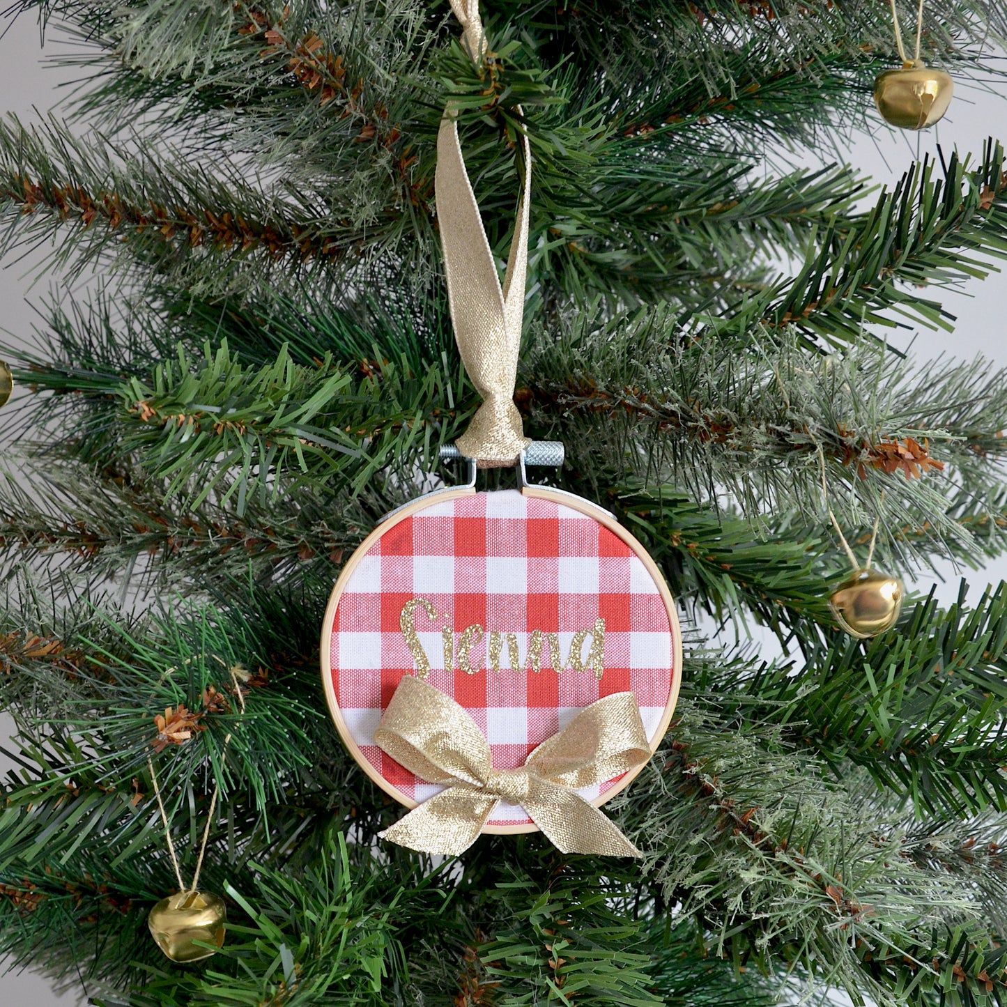 Name Christmas tree decoration in red check