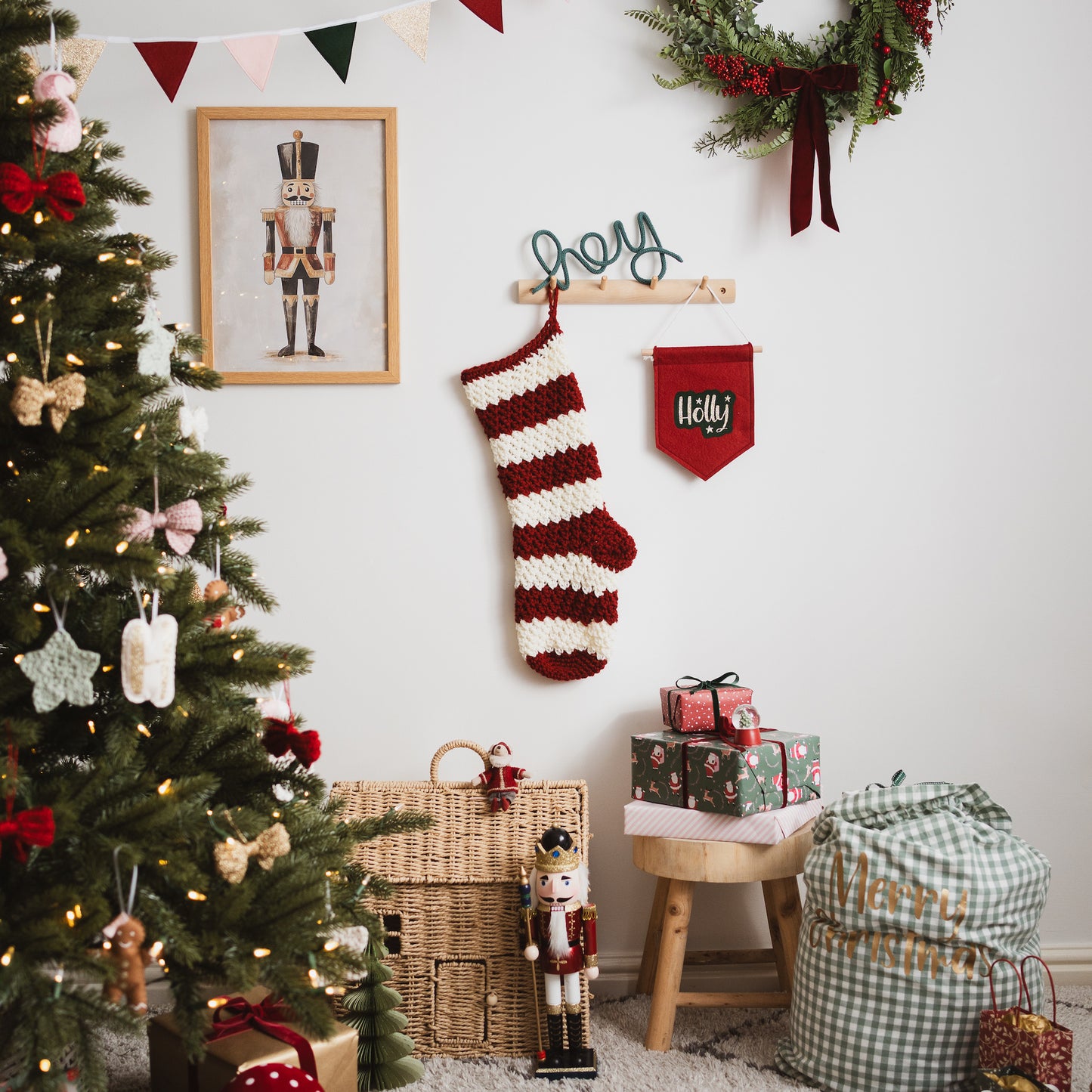 decorated Christmas tree with presents and a hanging stocking