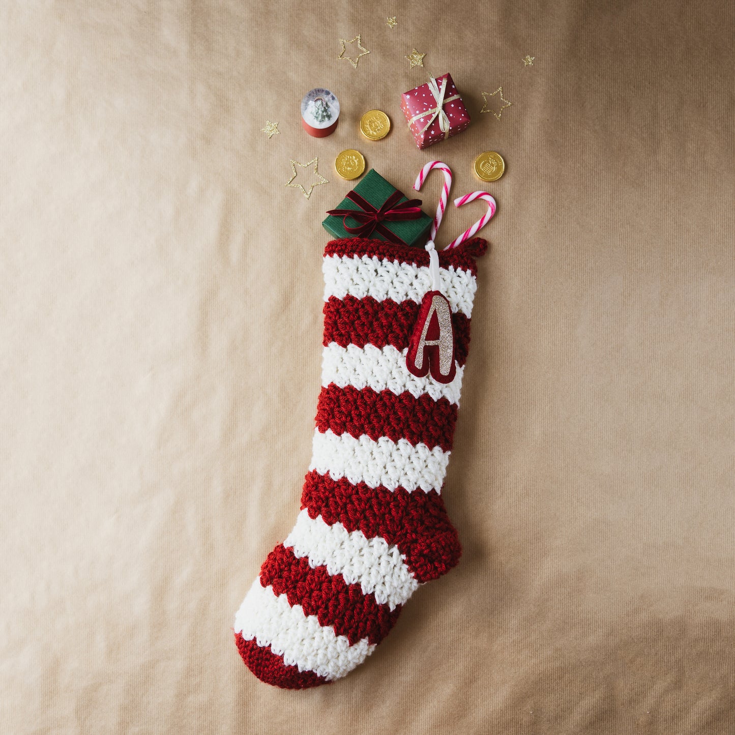 Personalised Christmas stocking filled with gifts and treats