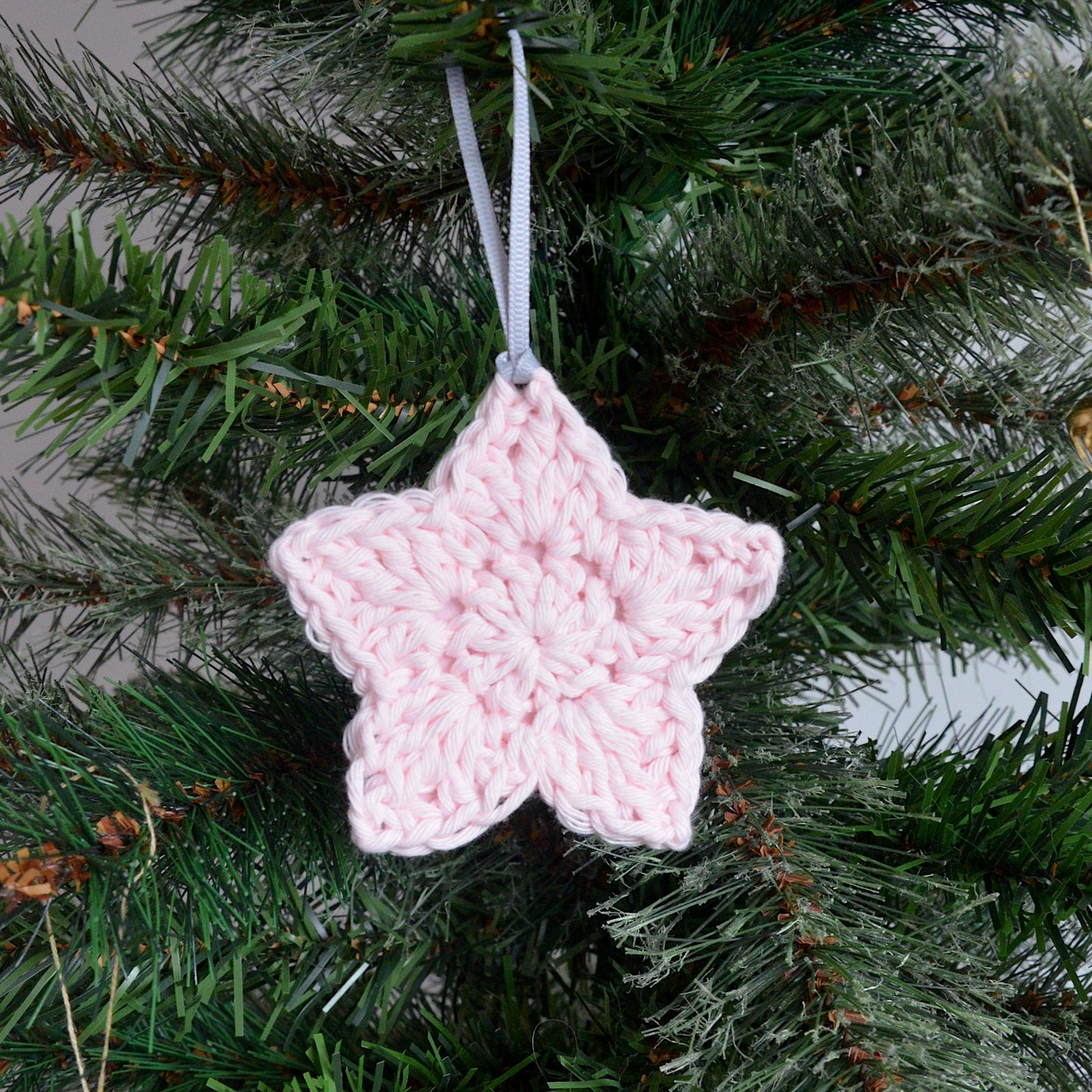 pink crocheted star tree decoration