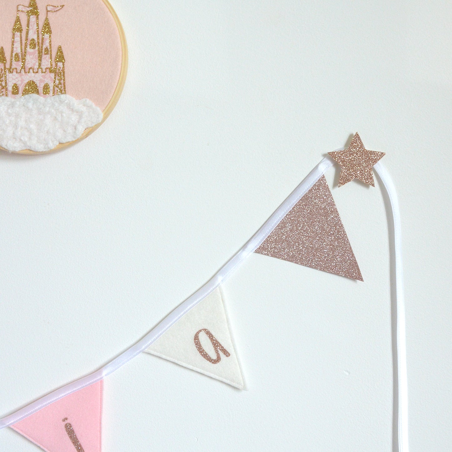 rose gold wall hooks to hang bunting in girls bedroom