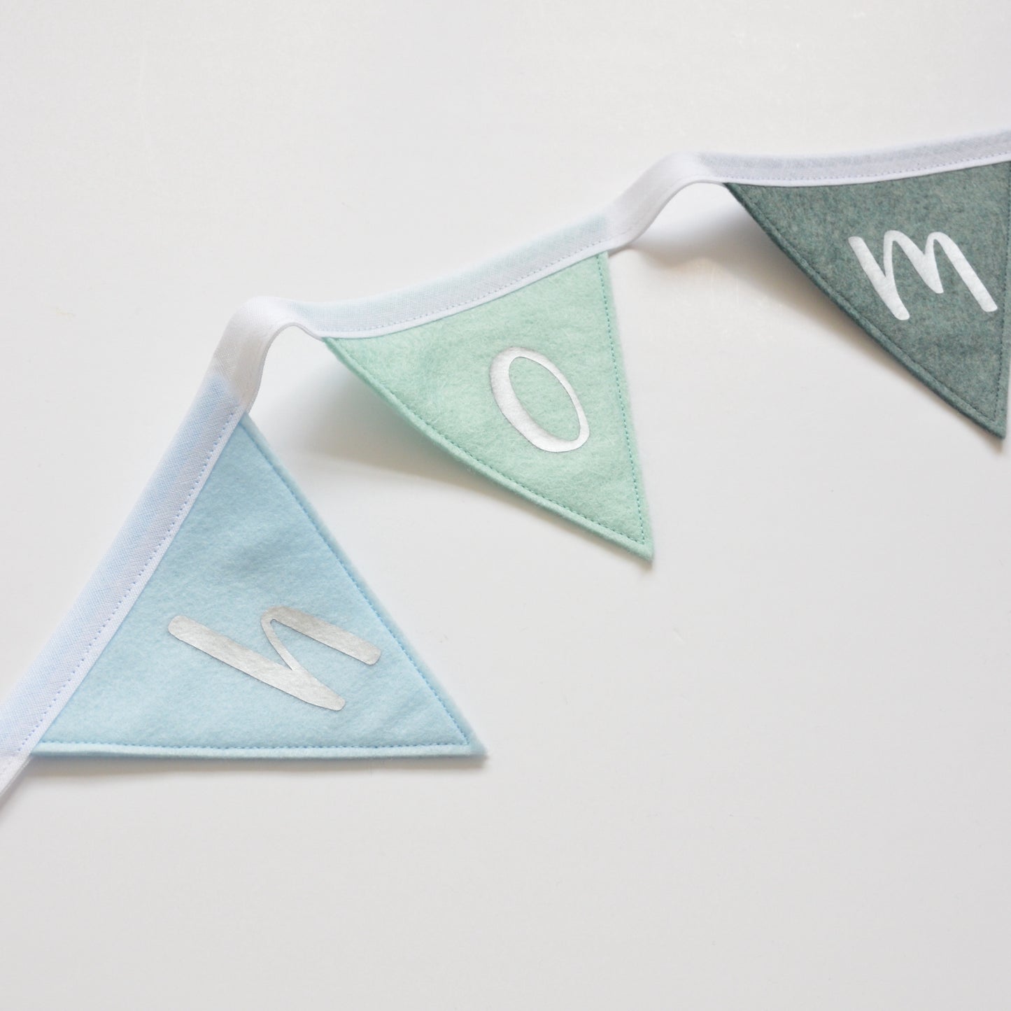 Personalised rainbow decorations for a nursery