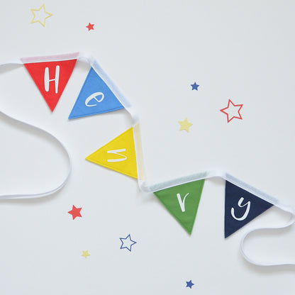 colourful nursery ideas. personalised bunting