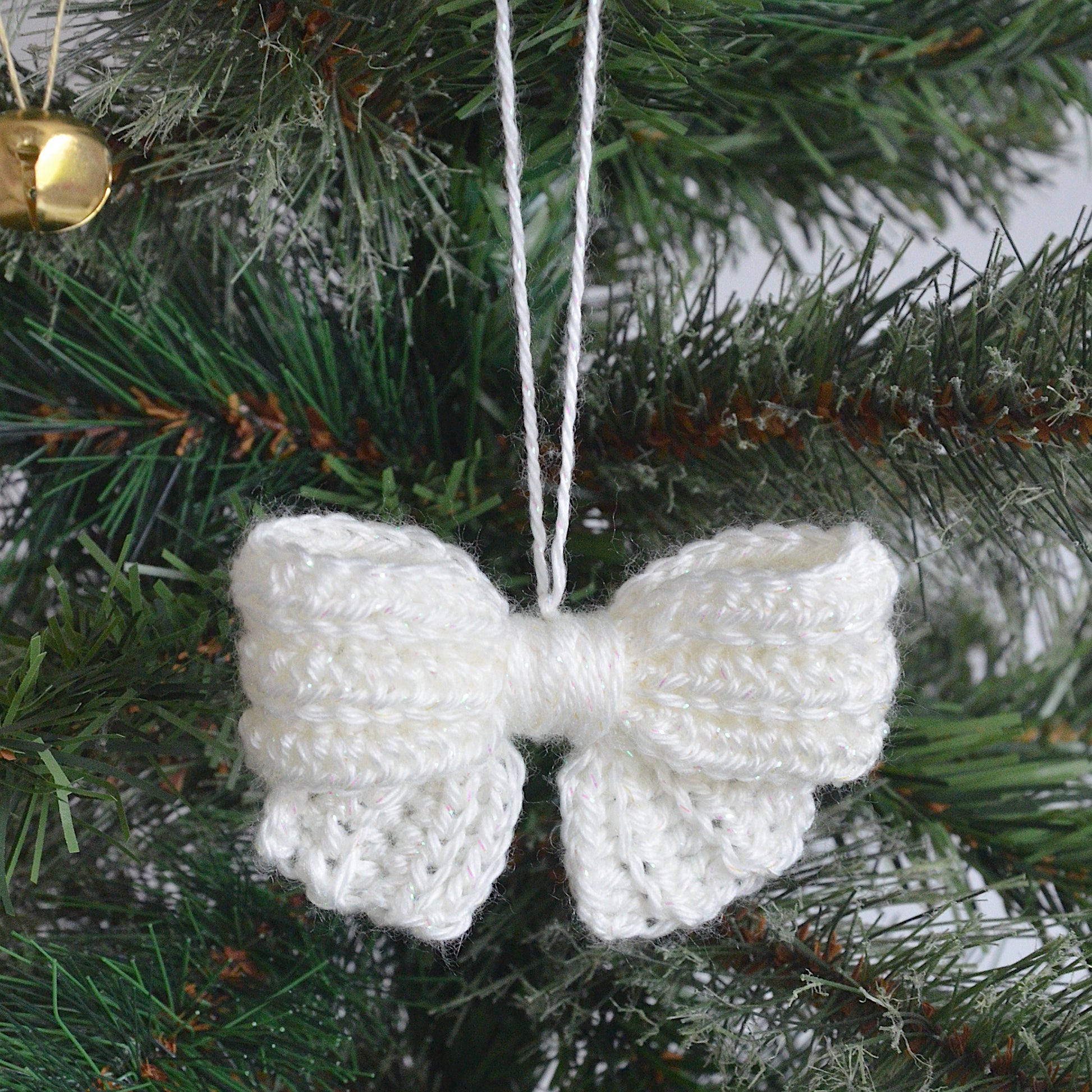 Cream crochet bow Christmas tree decoration