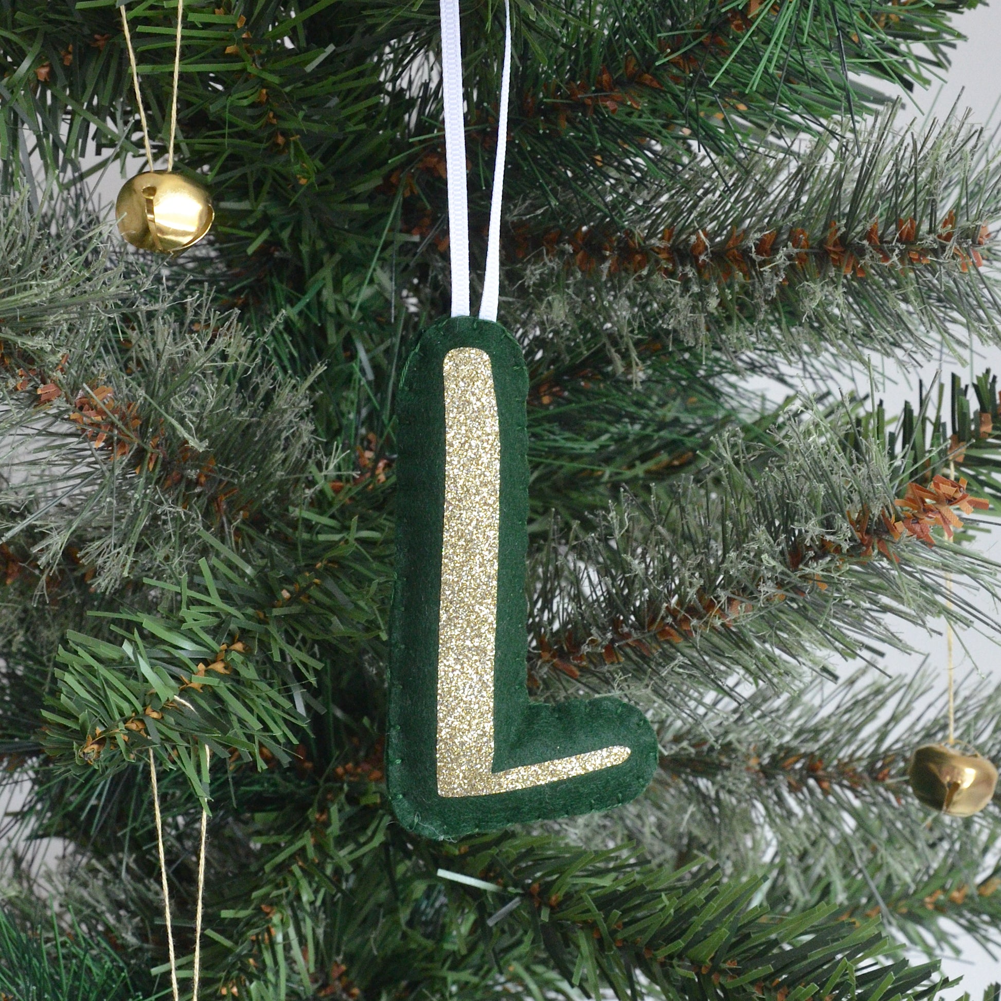 Green initial Christmas tree decoration