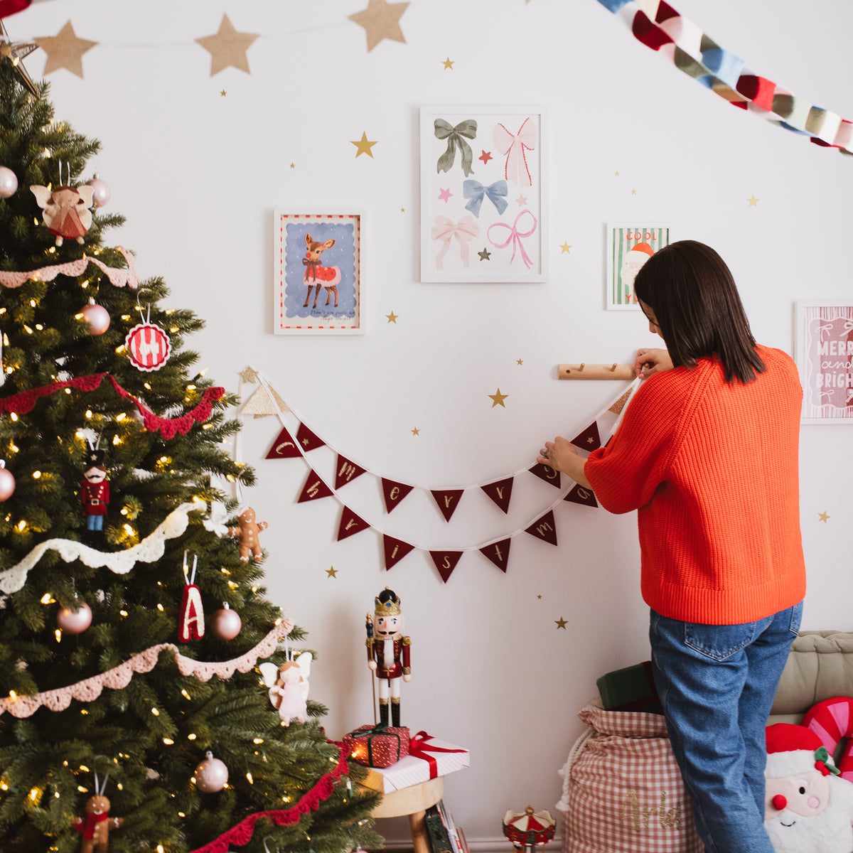 Handmade Christmas bunting in a room with Christmas tree