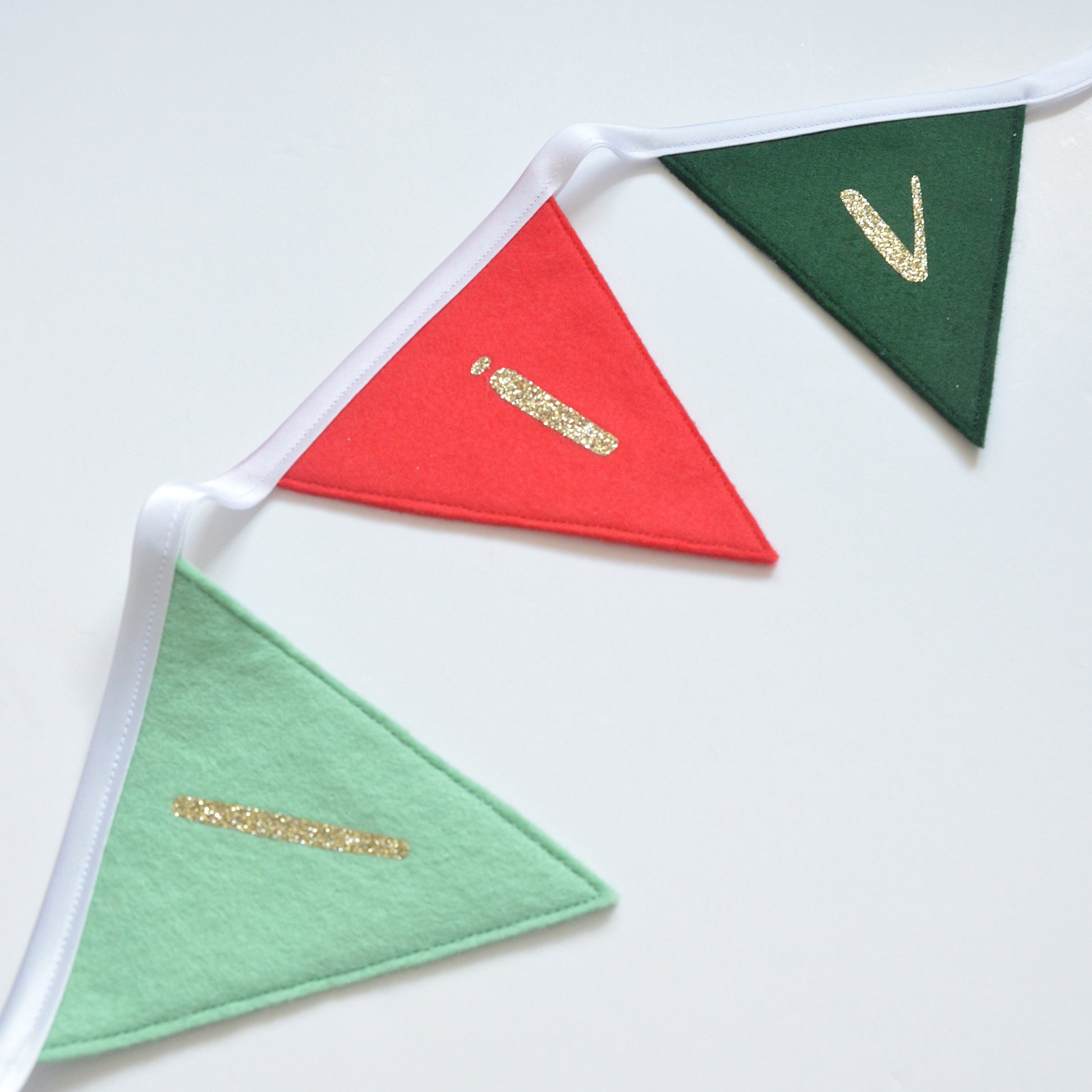 red and green name bunting