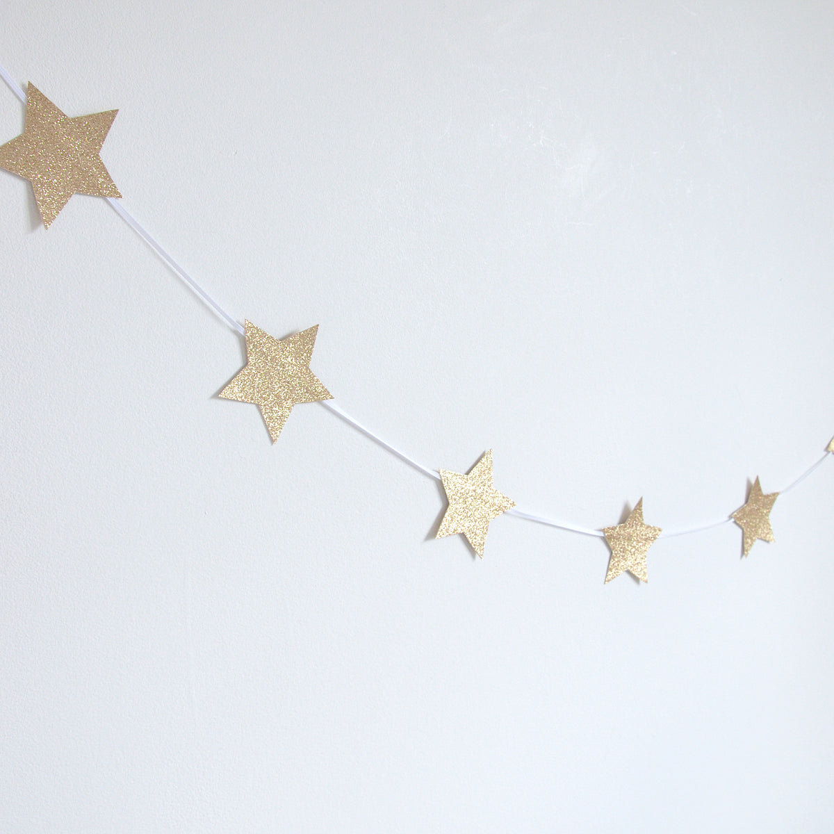 Reusable gold star Christmas garland