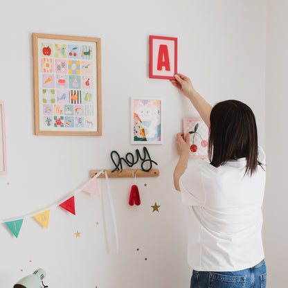 colourful felt letter wall art to hang in toddler girls room