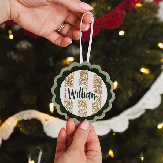 personalised Christmas tree decoration in green and gold