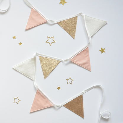 gold bunting for neutral nursery. Modern girls nursery decor