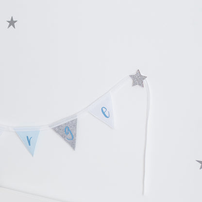 adhesive hooks to hang bunting in a child's room